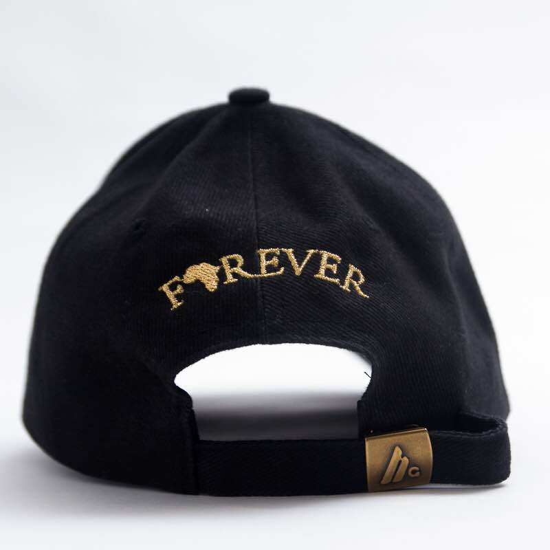 Africa Forever Original black baseball/dad hat with our signature Embroidery gold logo. One size fit all and adjustable strap.  Represent Africa anytime you put on this classic cap. 